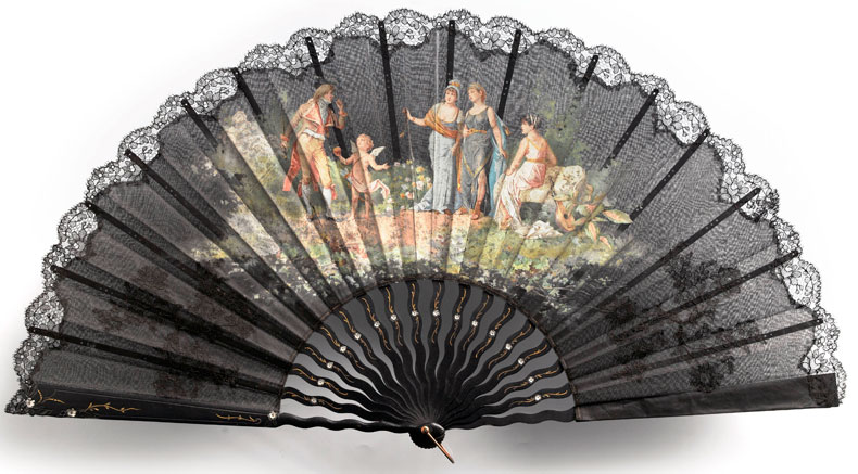 Black fan with a picturesque scene from life