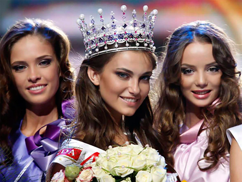 Beauty queen in crown and pretty girls