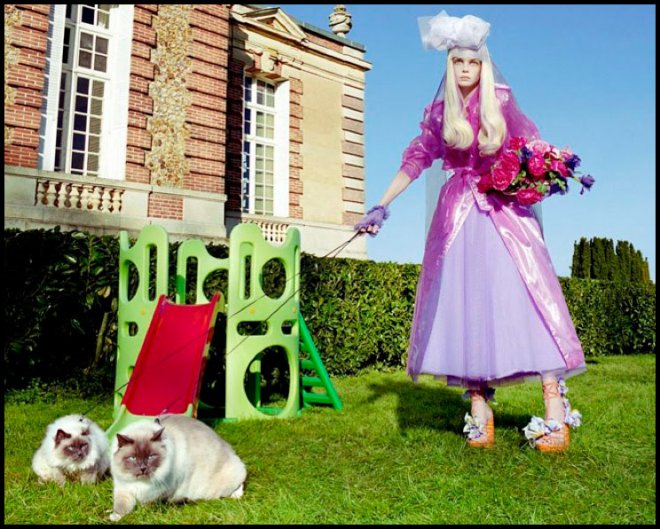 Girl with a cat, photographer Miles Aldridge