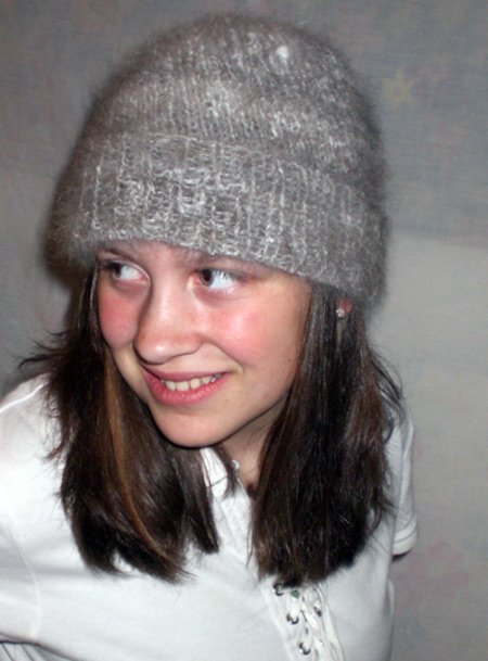 Girl blogger in a knitted hat photo