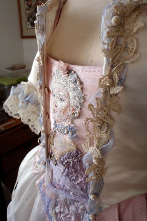 Dress decorated with rococo style embroidery, photo