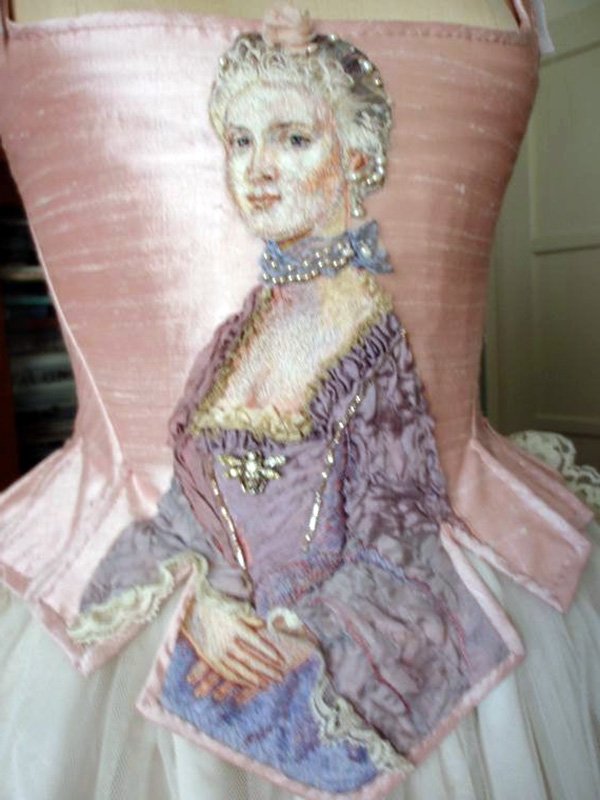 Dress decorated with rococo style embroidery, photo