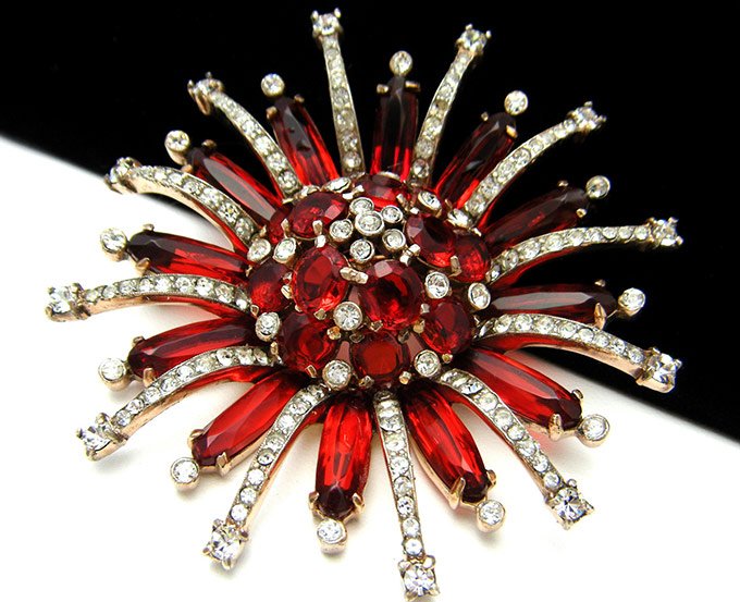 Brooch with red stones, photo