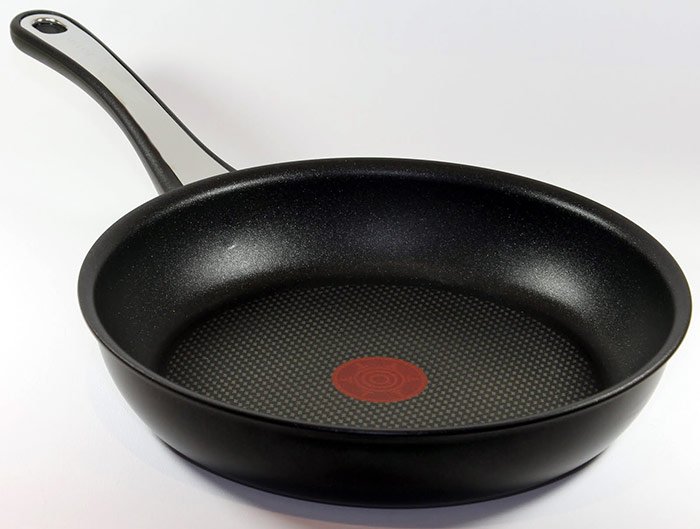 Aluminum frying pan with non-stick teflon coating photo