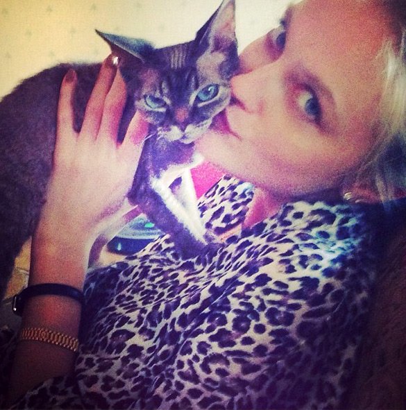 Top model Vlada Rosyalkova and a cat, photo