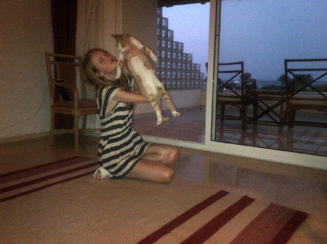 Top model Vlada Rosyalkova and a cat, photo