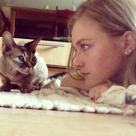 Top model Vlada Rosyalkova and a cat, photo