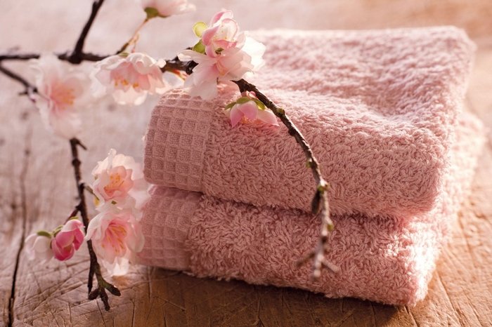 Pink towel and flowers