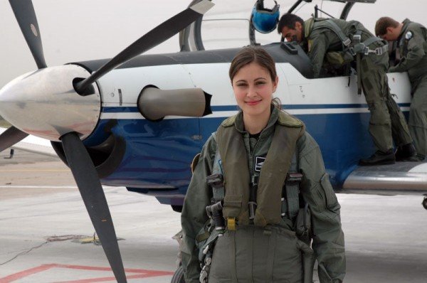 Girl in military uniform serving in the army