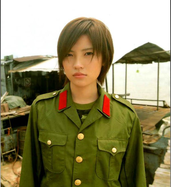 Girl in military uniform serving in the army