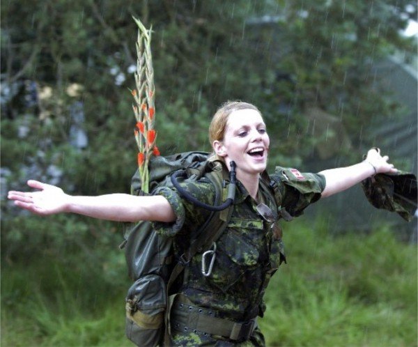 Girl in military uniform serving in the army