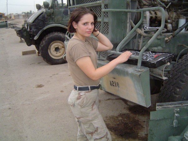 Girl in military uniform serving in the army