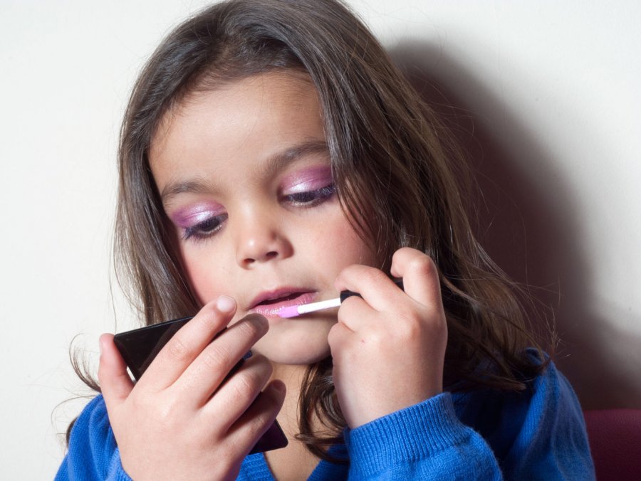 Girl doing makeup for a photo shoot