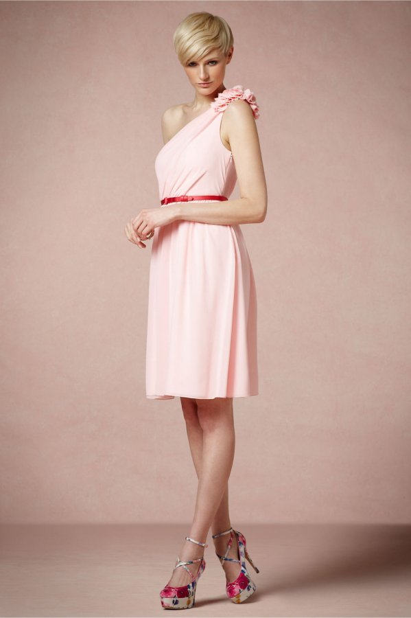 Photo of a girl in a soft pink dress