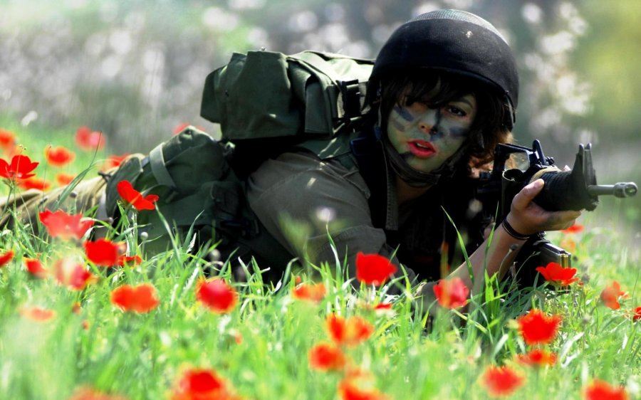 Girl in military uniform and military service for girls