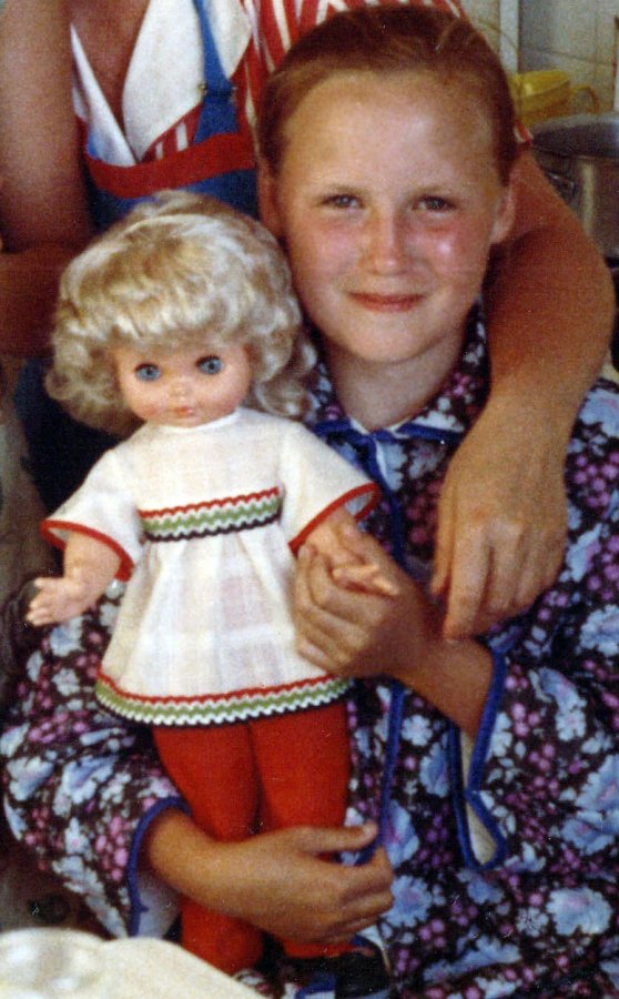 Girl with a doll of Soviet times