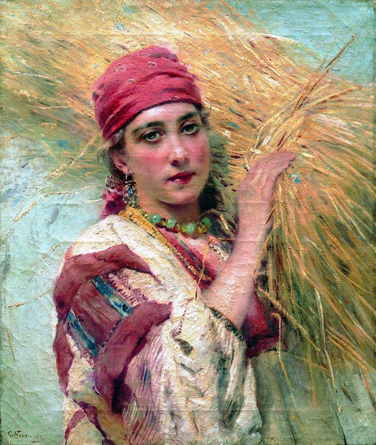 Girl with a sheaf of hay