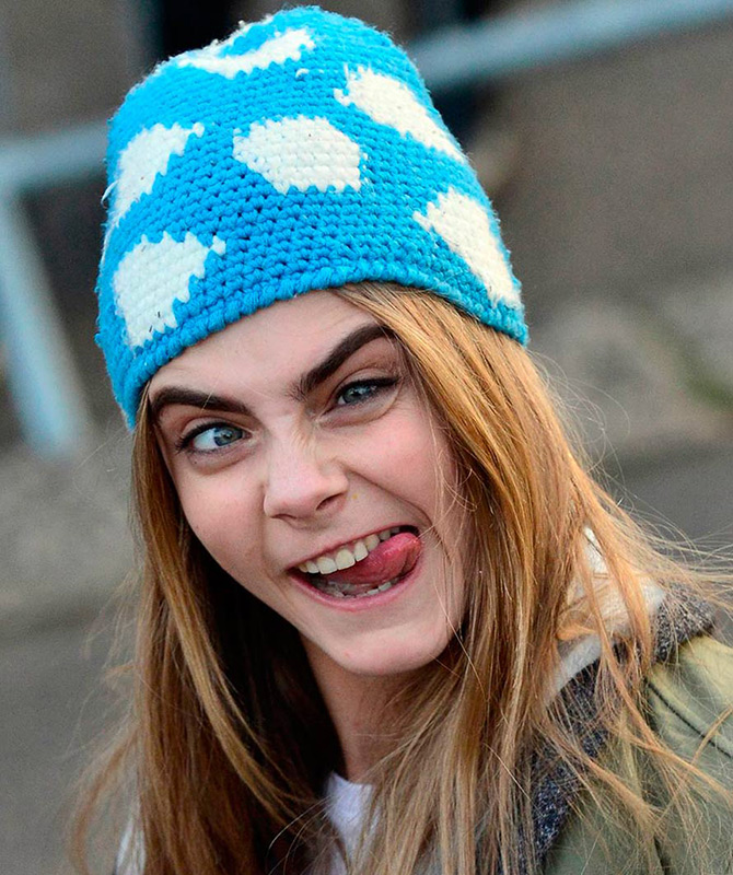 Cara Delevingne grimaces