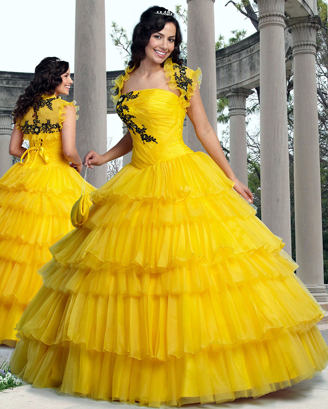 Happy girl in yellow dress