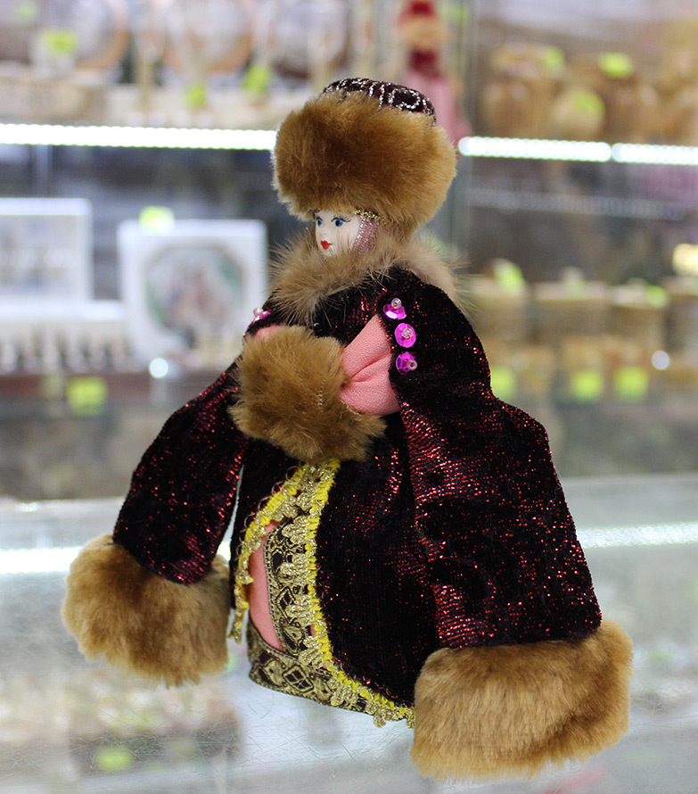 Doll in a fur coat