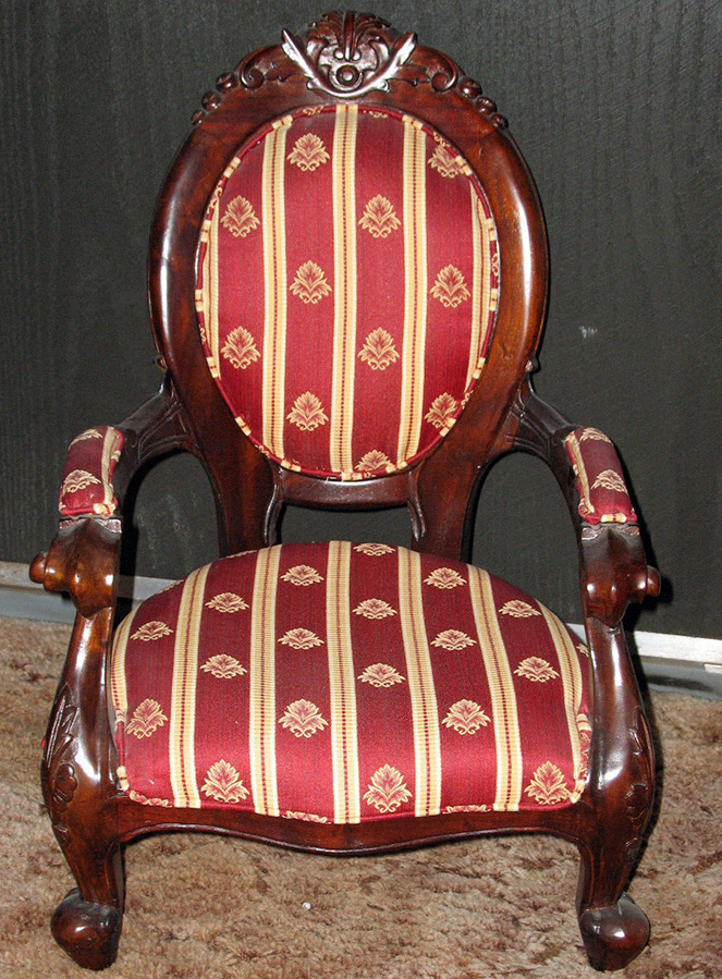 A chair for a doll as an interior decoration