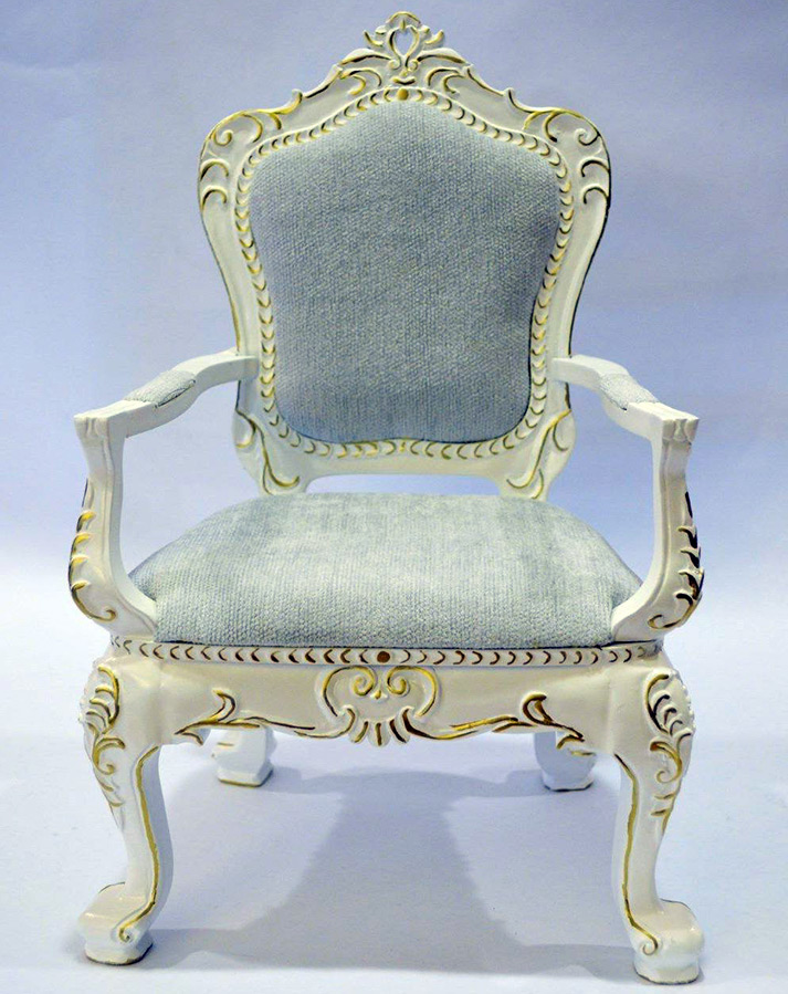 A chair for a doll as an interior decoration