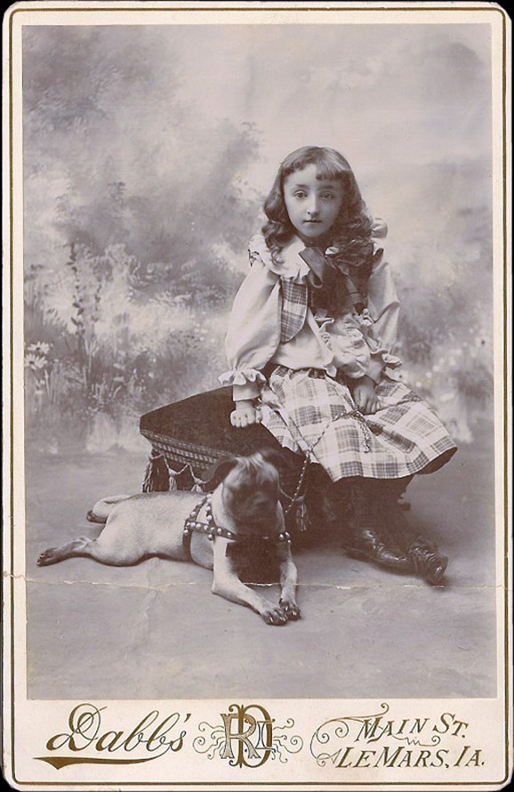 Old photo - a girl with a dog