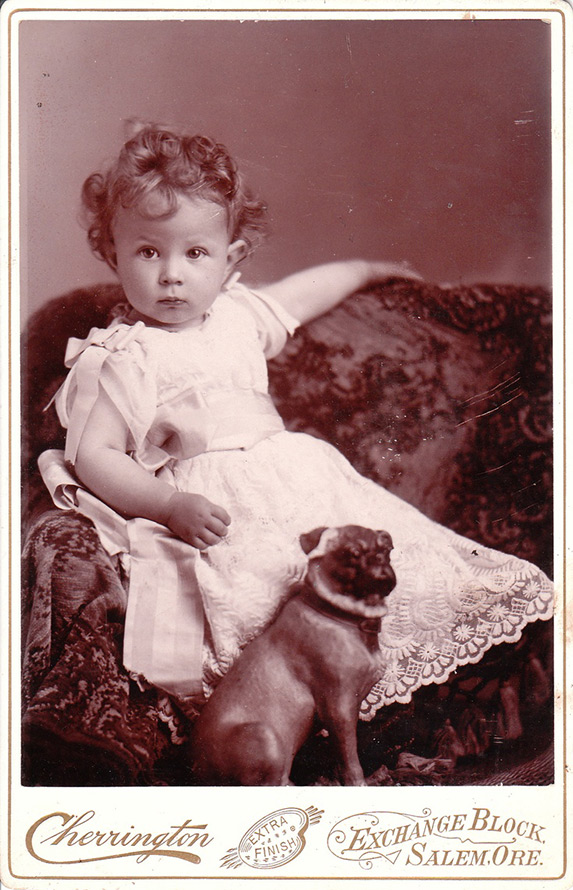 Old photo - a girl with a dog