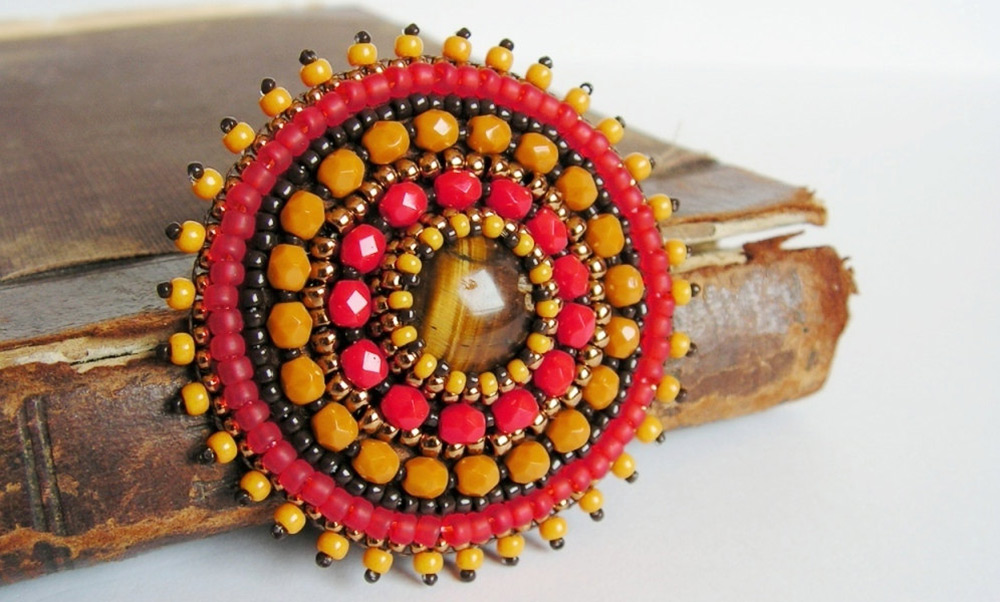 Choosing a brooch made of beads and beads