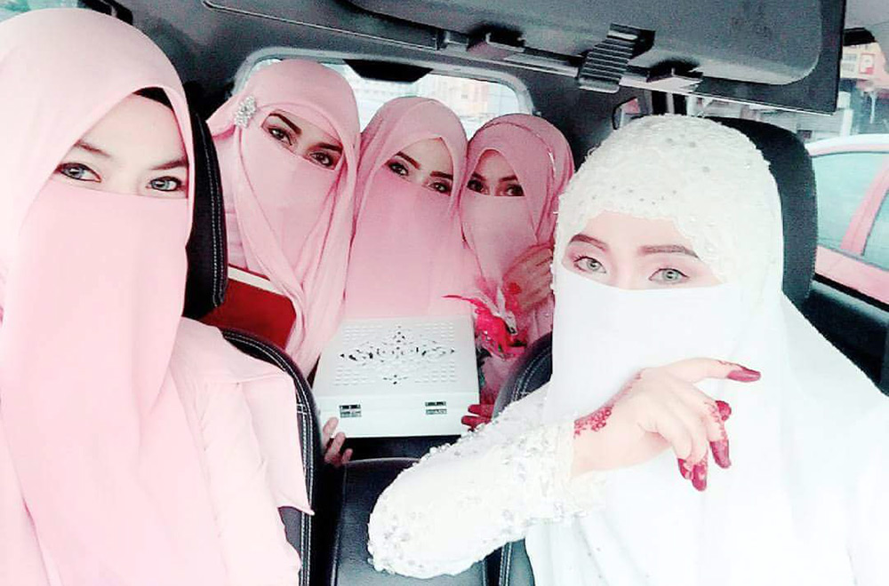 Muslim bride and bridesmaids