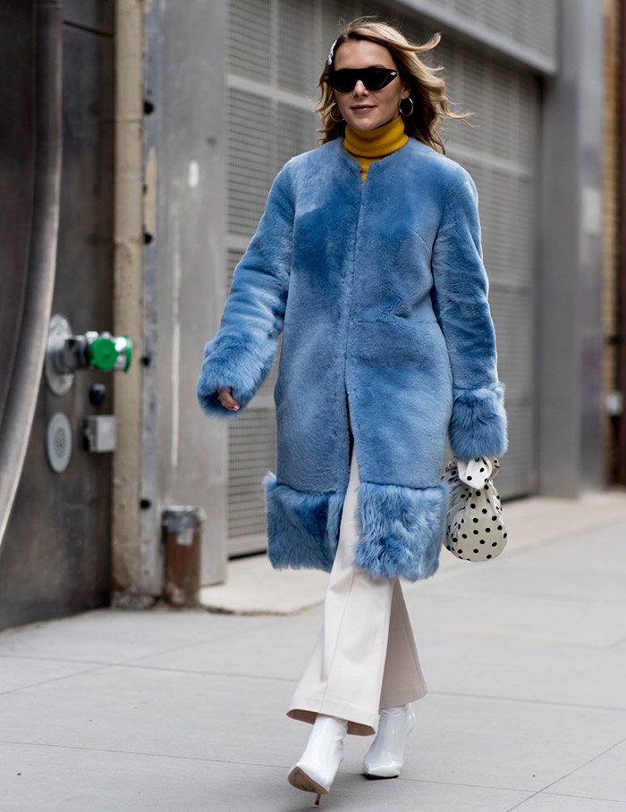 Fur coats of guests of the Fashion Week