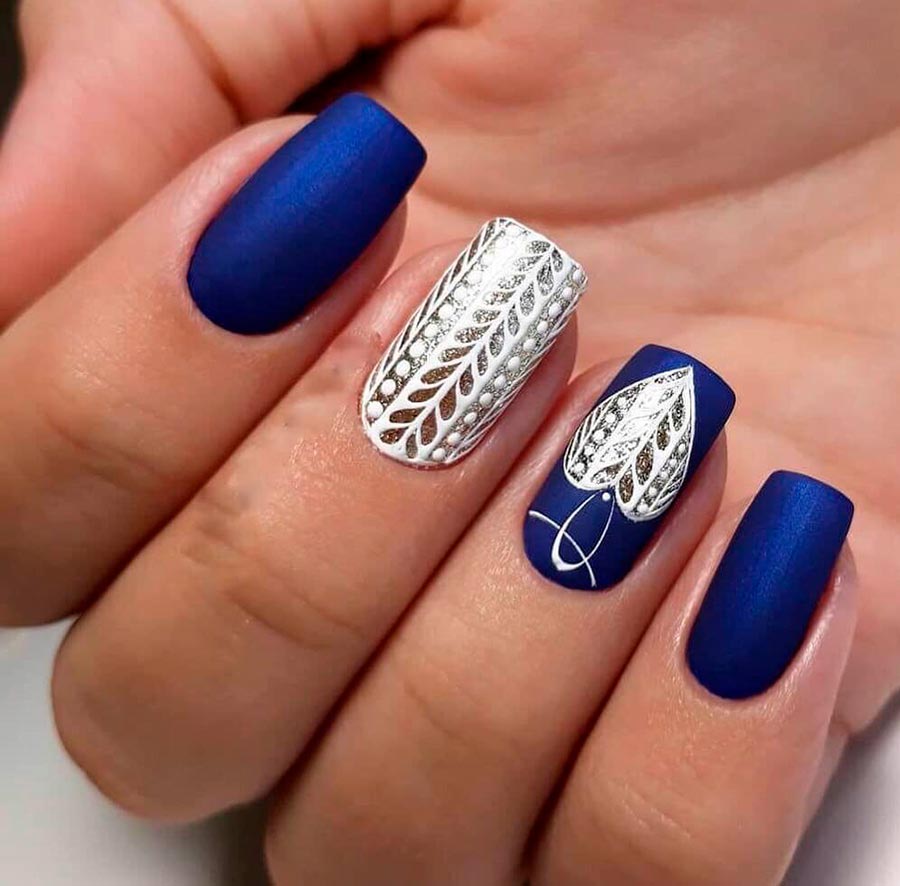 Manicure under a blue dress