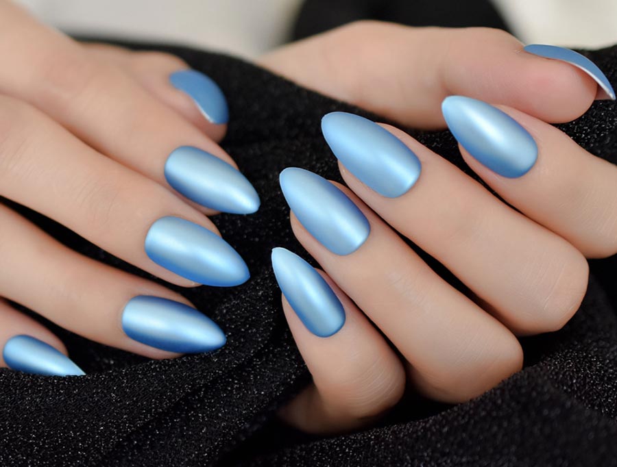 Manicure under a blue dress