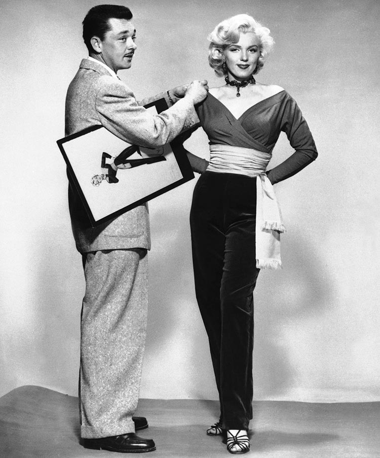 Marilyn Monroe and William Travilla